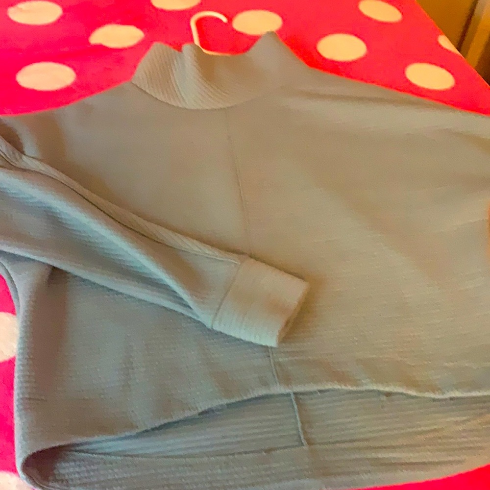 This is a thick blue sweater.